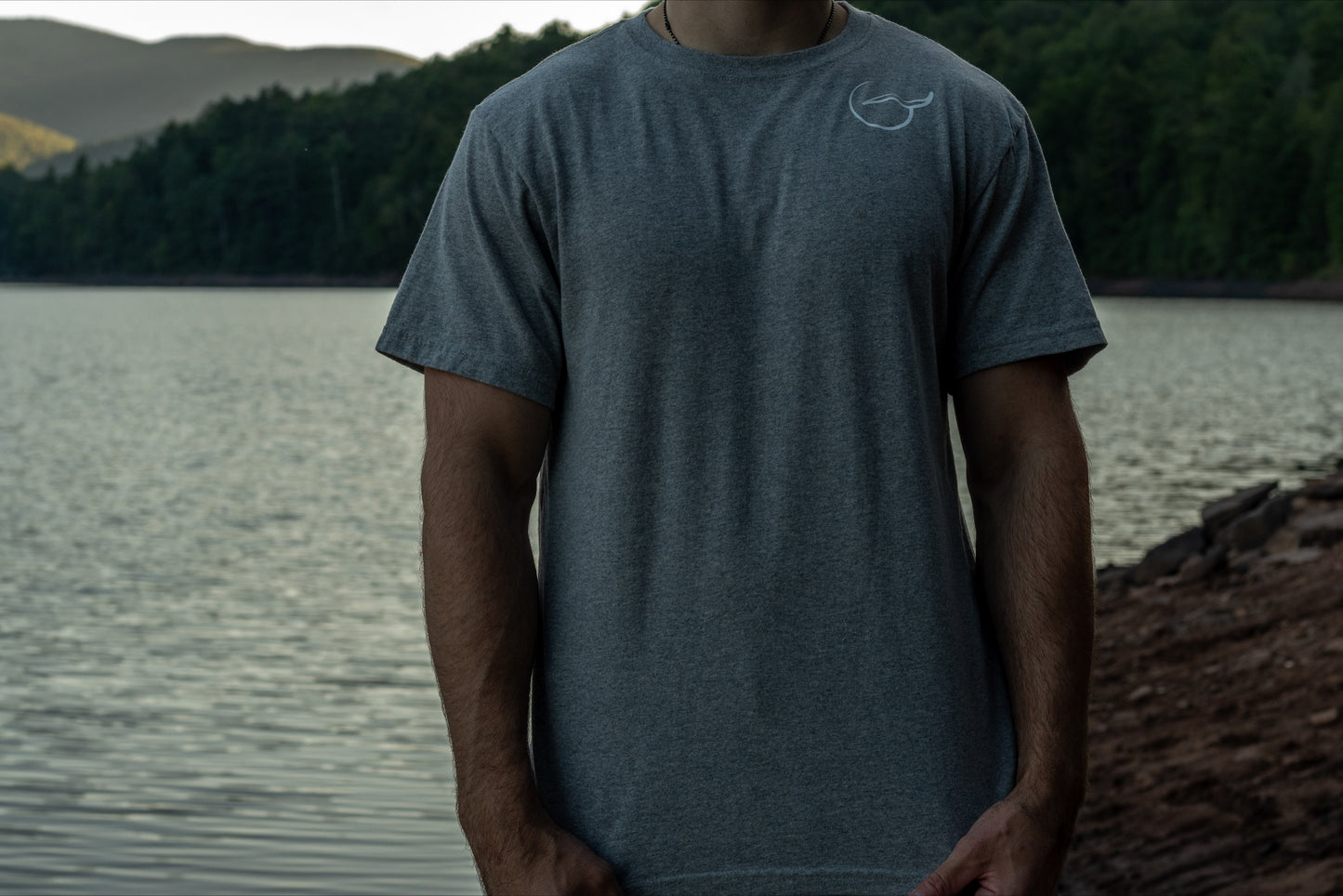 50/50 recycled cotton polyester, grey t short sleeve shirt, front with logo on the chest.