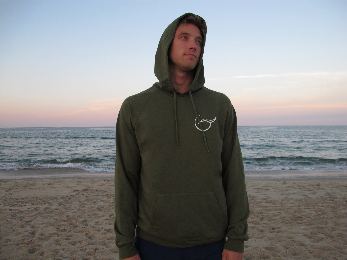 Breath unisex green hoodie, made in the USA from 100% organic cotton. Ethically crafted for a soft, sustainable, and stylish fit.